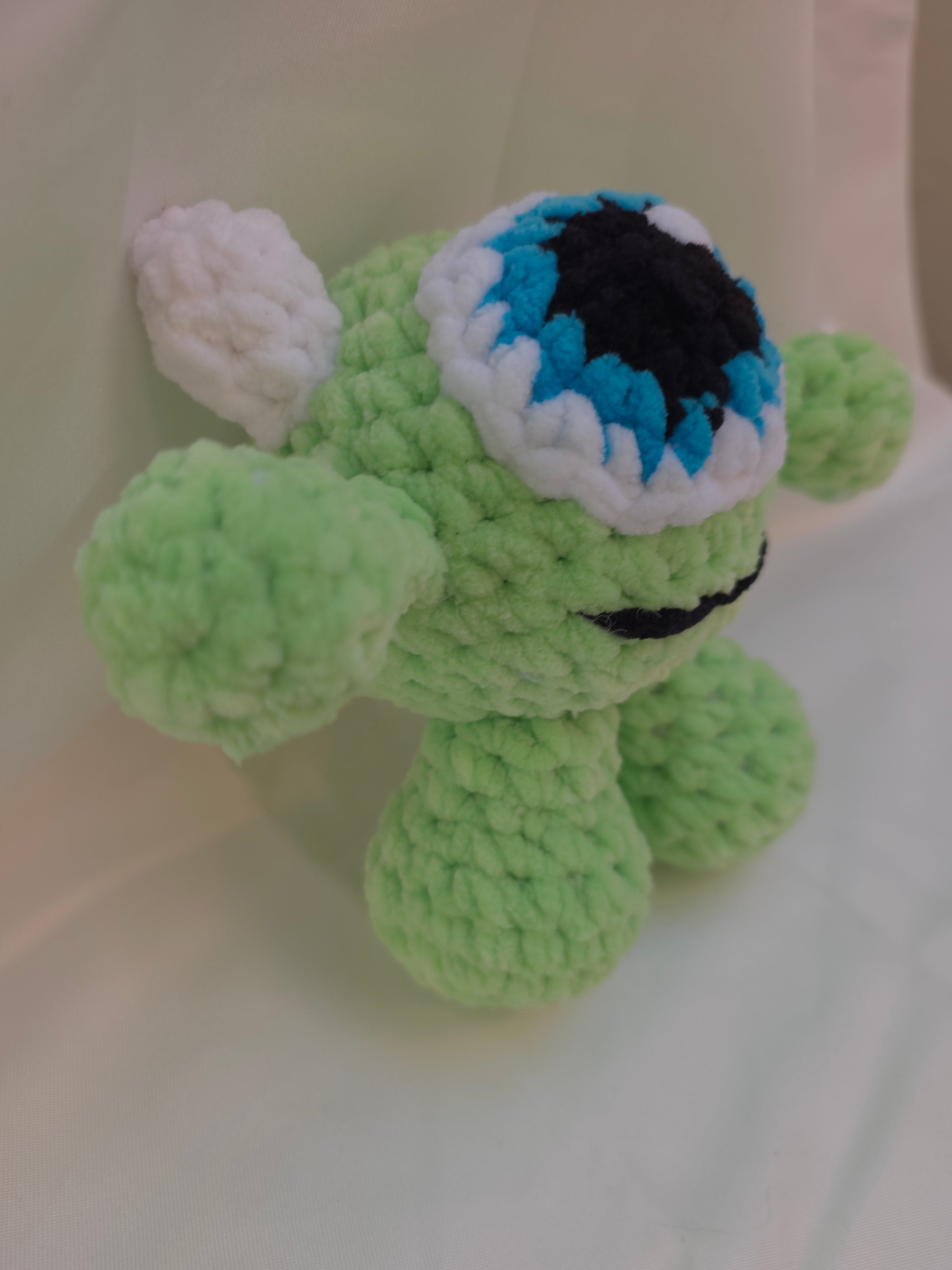 👁️ Mini monstre vert au crochet – compagnon fun et décalé
