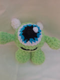 👁️ Mini monstre vert au crochet – compagnon fun et décalé